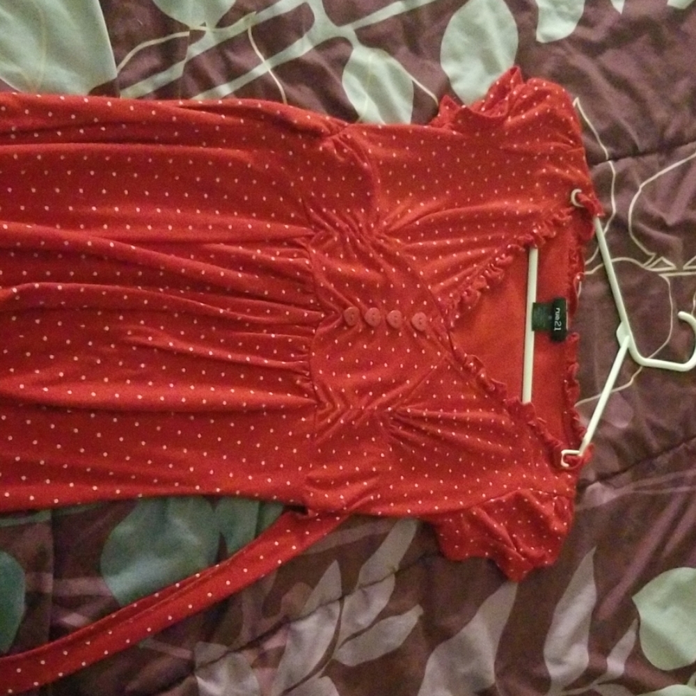 Red polka dotted shirt